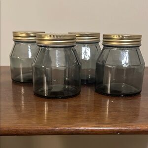 Set of 4 Glass Jars with Gold Lids